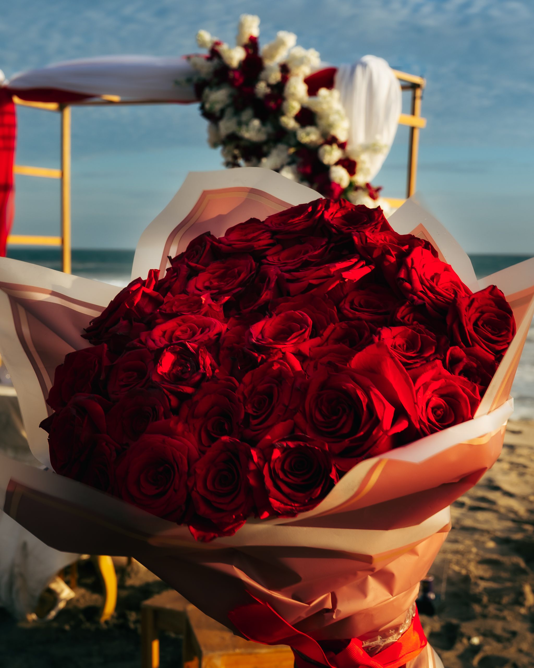 Romantic Beach Wedding with Red Roses · Free Stock Photo