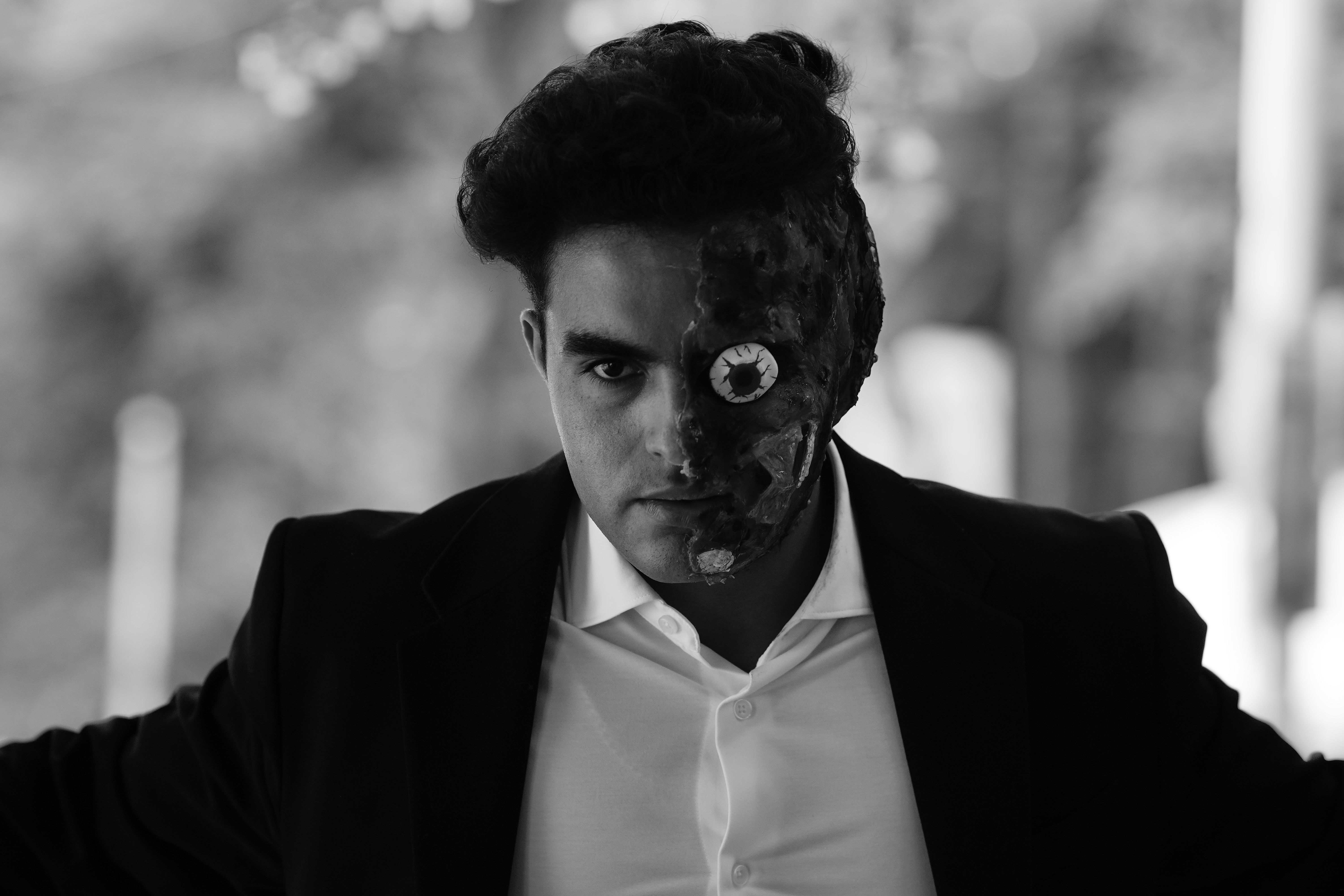 Dramatic Portrait of Man with Artistic Face Mask · Free Stock Photo