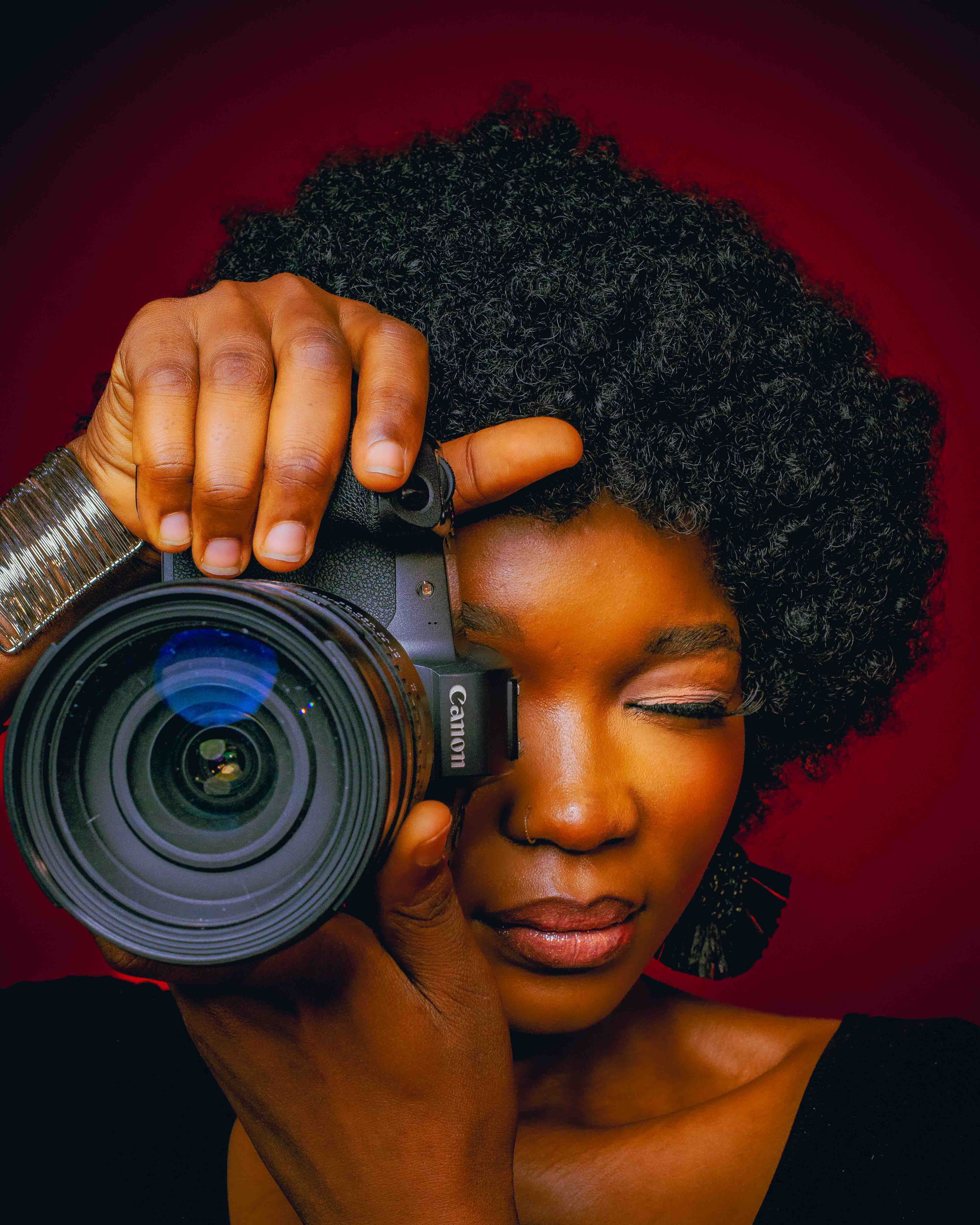 Portrait of a Photographer with Camera · Free Stock Photo