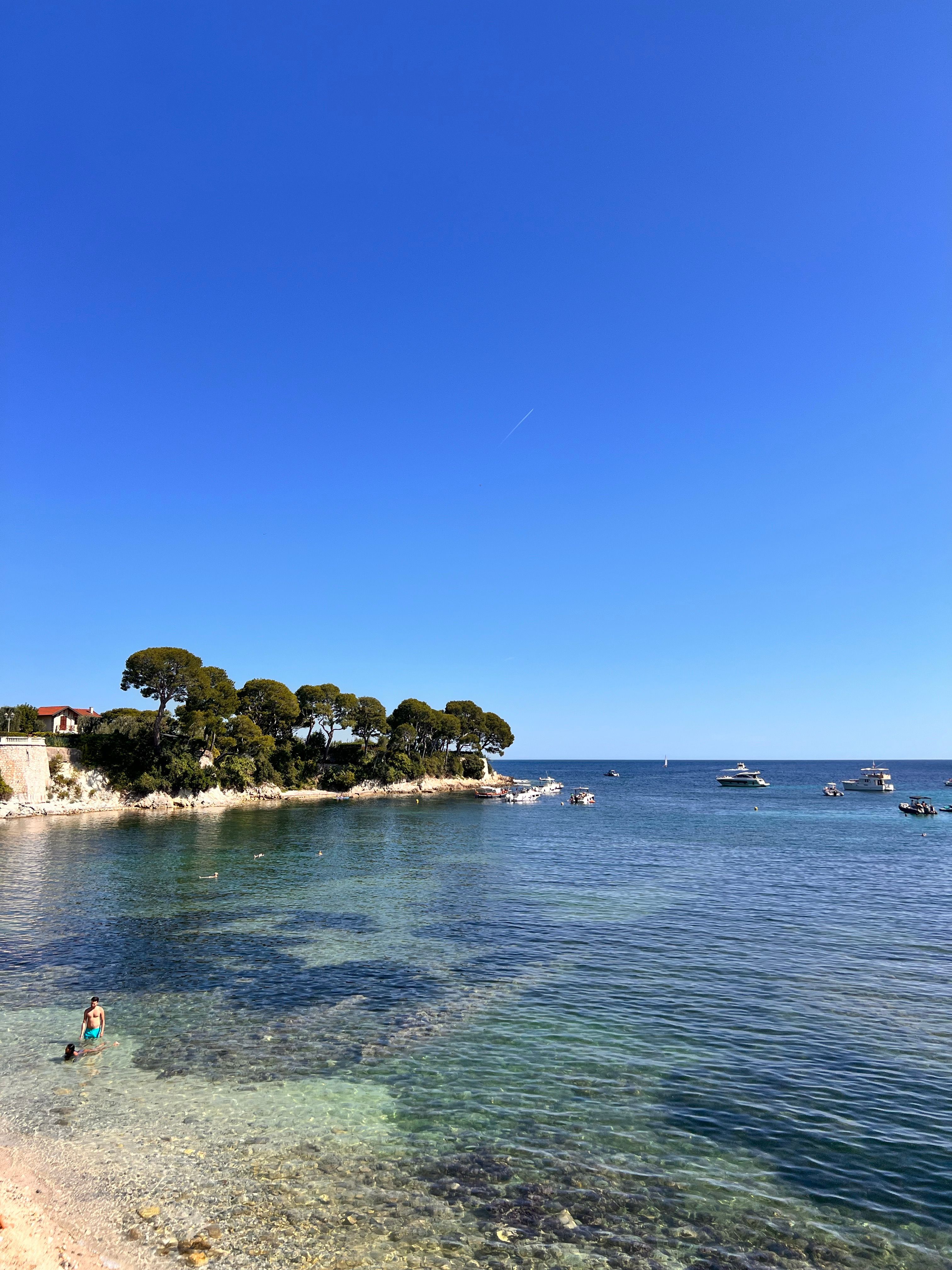 Scenic Mediterranean Coastal View with Boats · Free Stock Photo