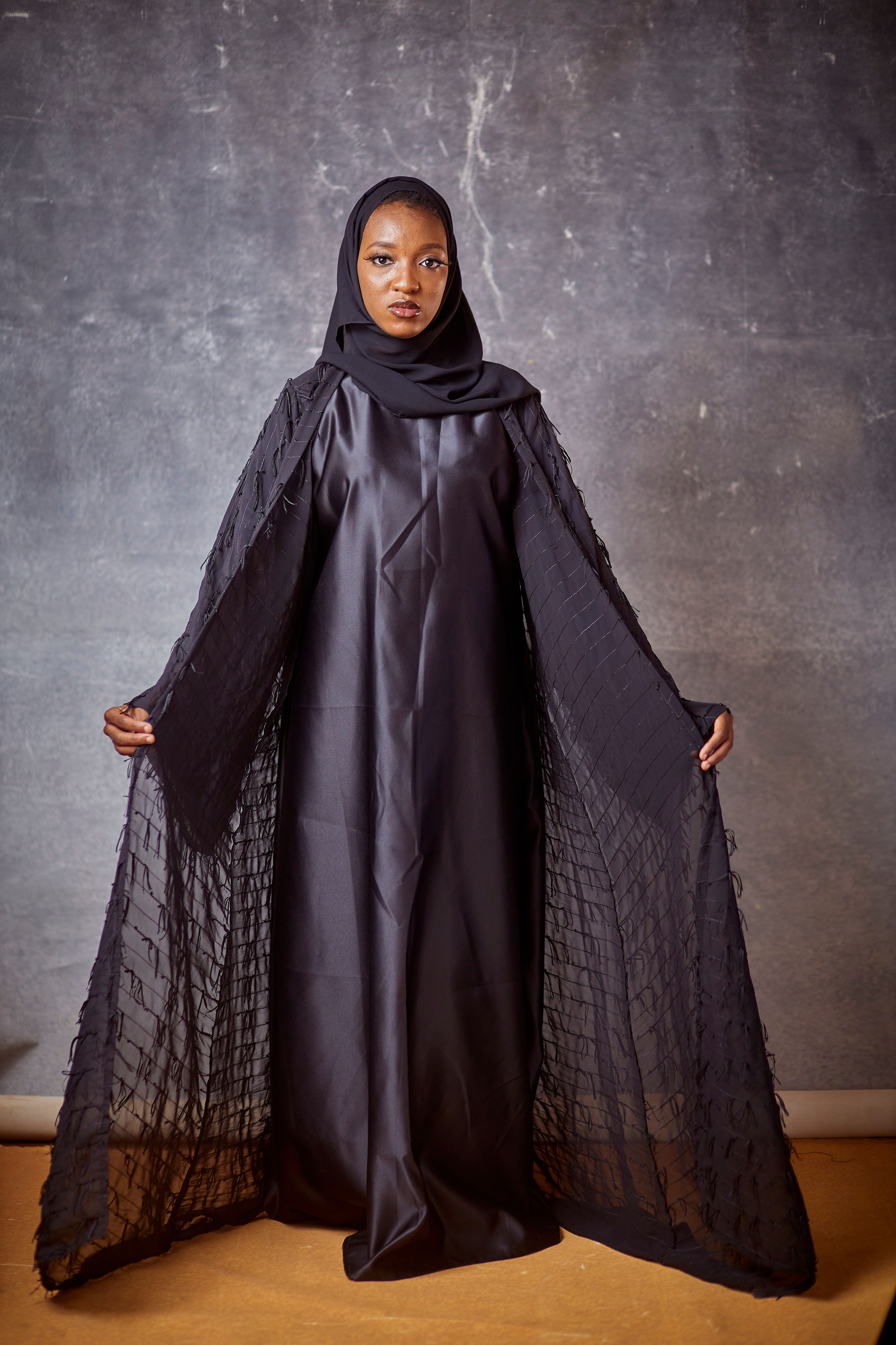 Elegant Woman in Black Traditional Dress · Free Stock Photo