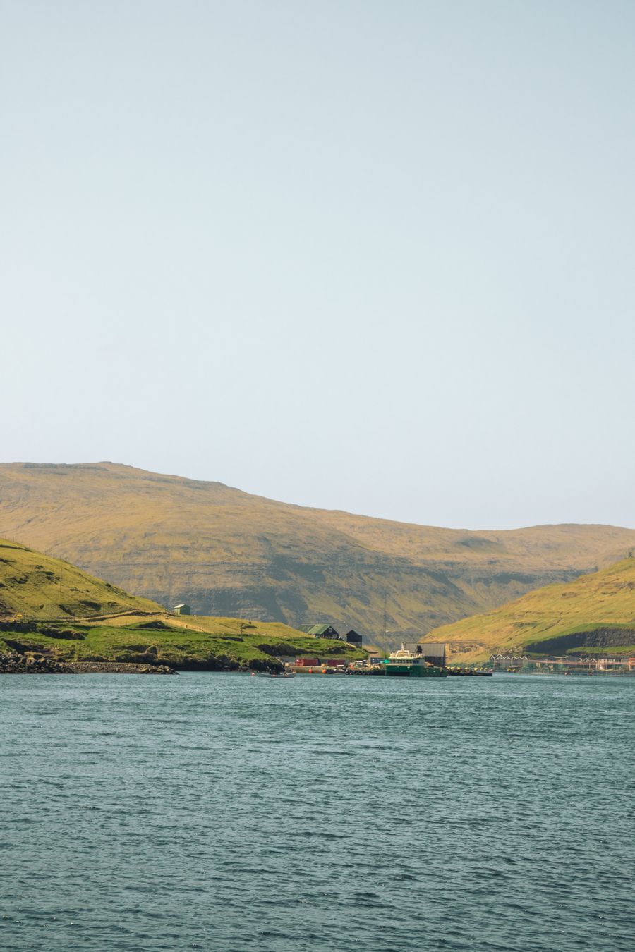Untouched landscape with hills and ocean in the Faroe Islands — photo by Maksim Smirnov on Pexels