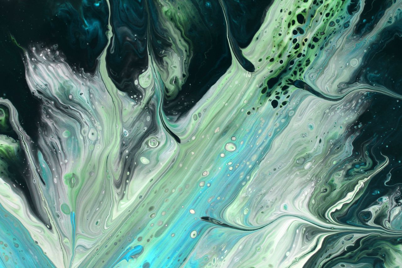vibrant fluid art featuring dynamic blue and green swirls creating a s
