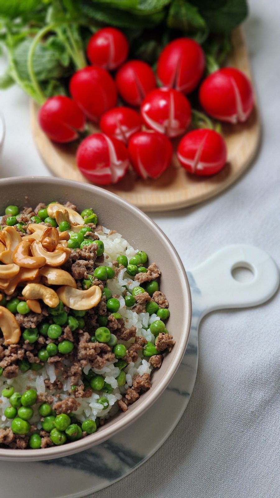 Ground beef rice bowl with peas and vegetables