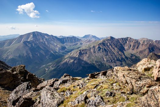 Stunning view of the Colorado Rocky Mountains under a clear blue sky.