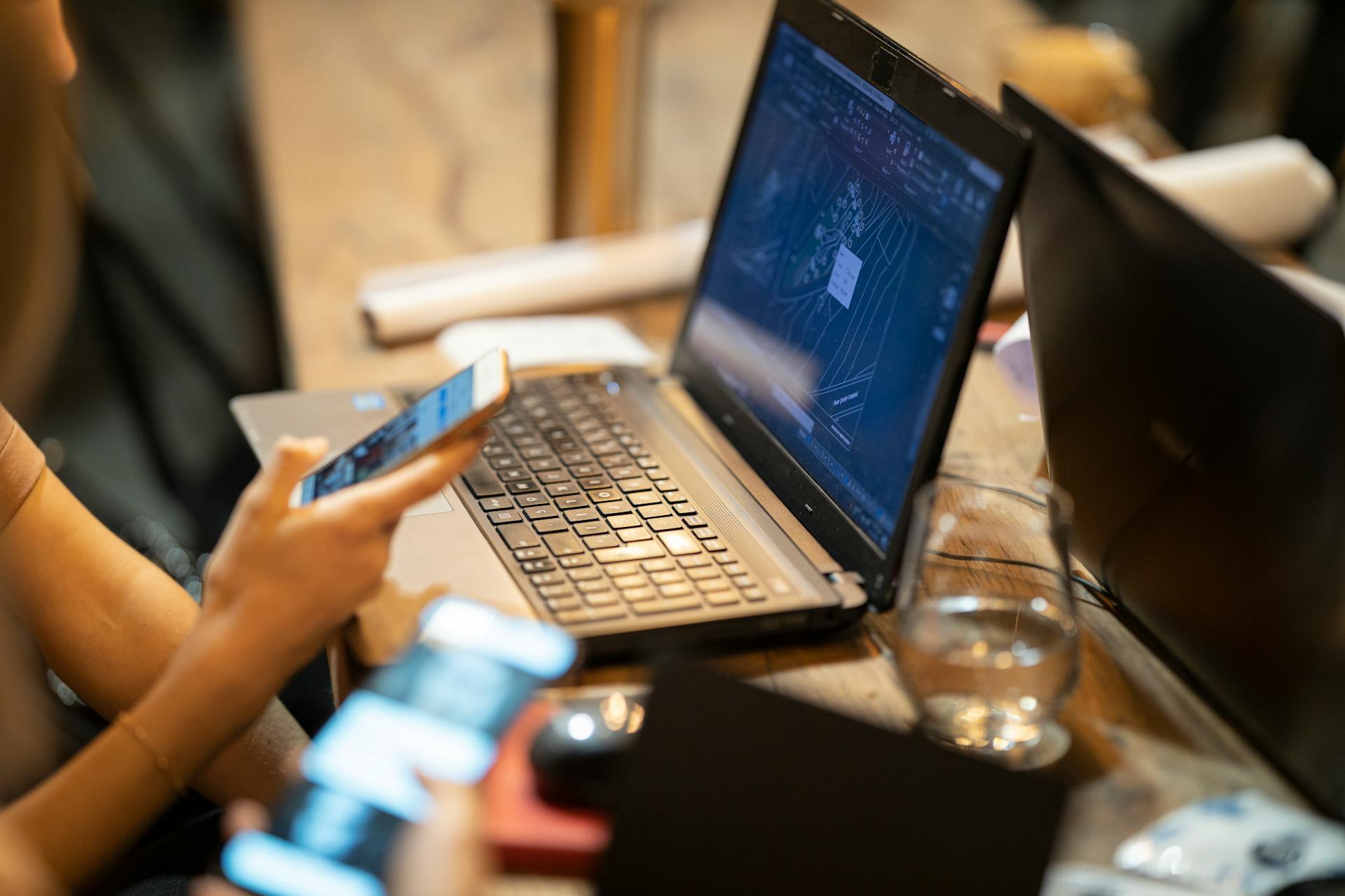 Photo Of Person In Front Of Laptop