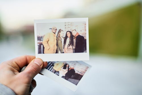 Free Person Holding Pictures Stock Photo