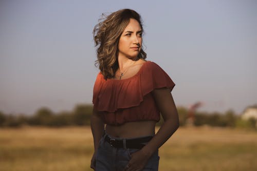 Shallow Focus Photo of Woman Wearing Tube Top