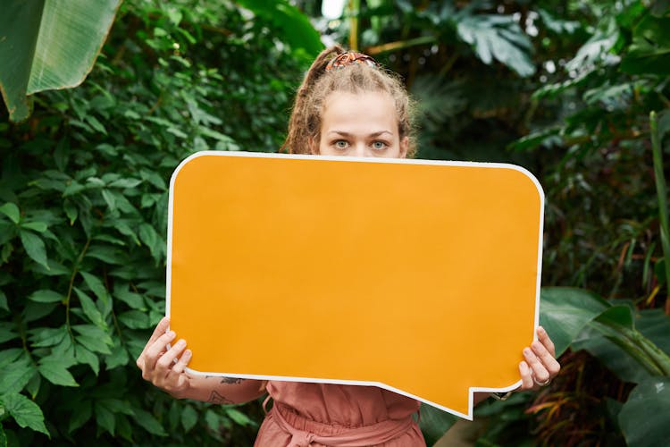 Photo Of Woman Holding Sign Board