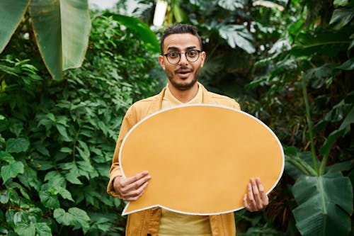 Free Photo Of Man Holding Signage Stock Photo