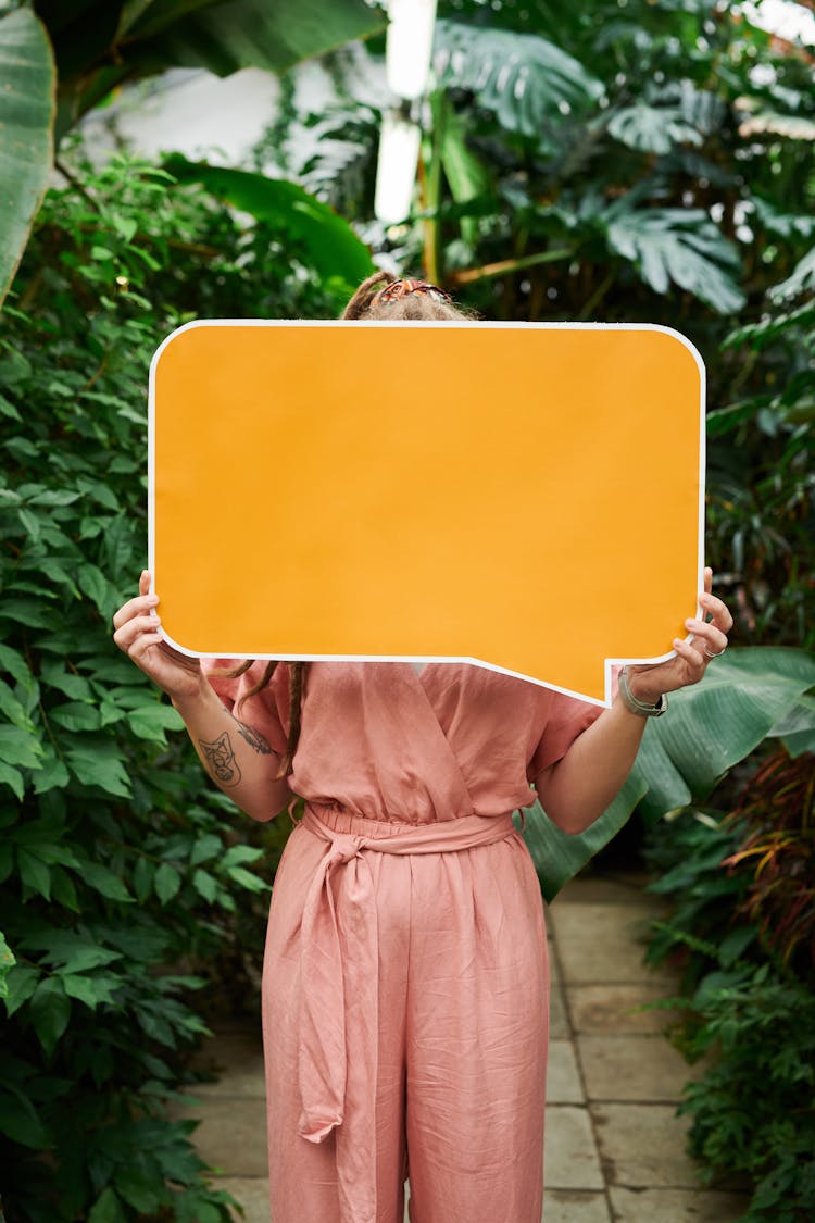 Photo Of Woman Holding Sign Board