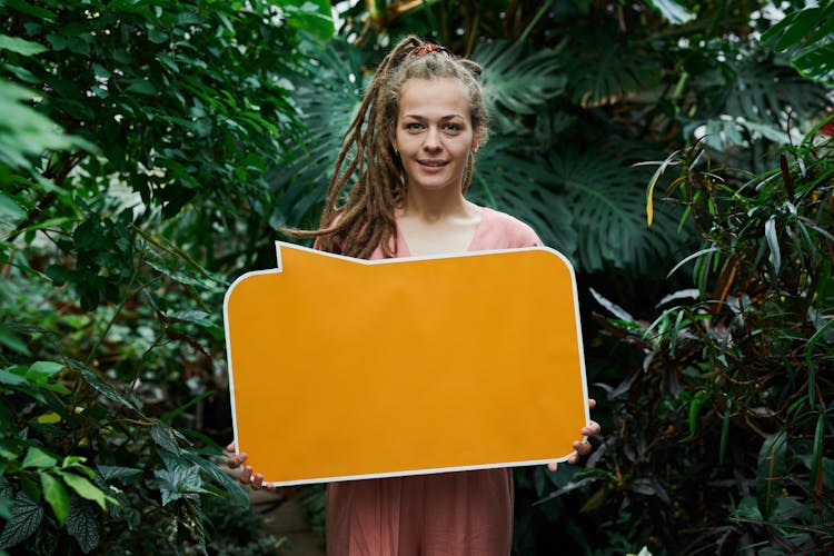 Photo Of Woman Holding Sign Board