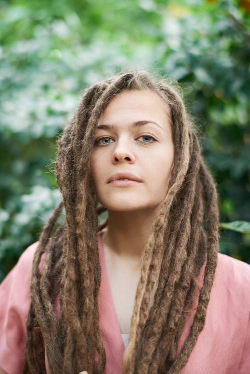 Shallow Focus Photo of Woman With Dreadlocks Hairstyle