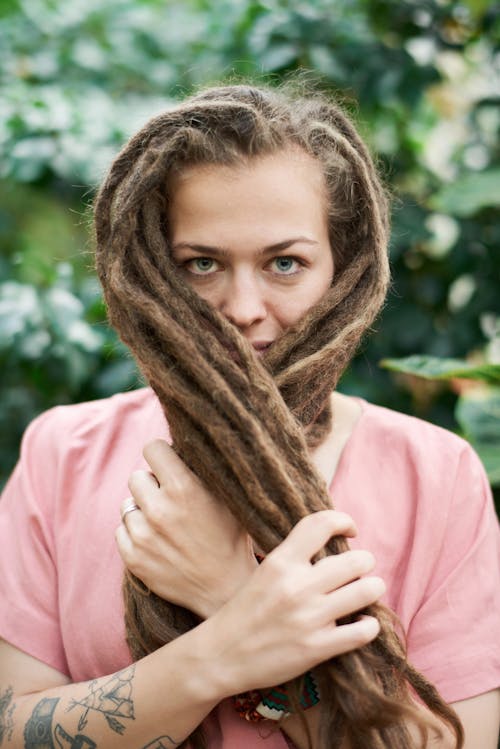 Woman Covering Her Face With Her Hair