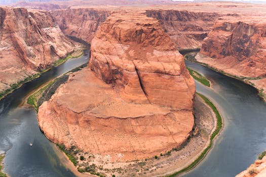 Stunning aerial photograph of the iconic Horseshoe Bend along the Colorado River in Arizona.