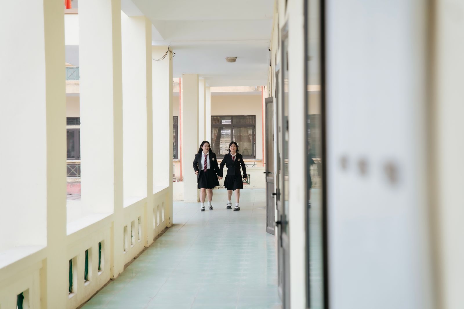 Students walking together in a school corridor