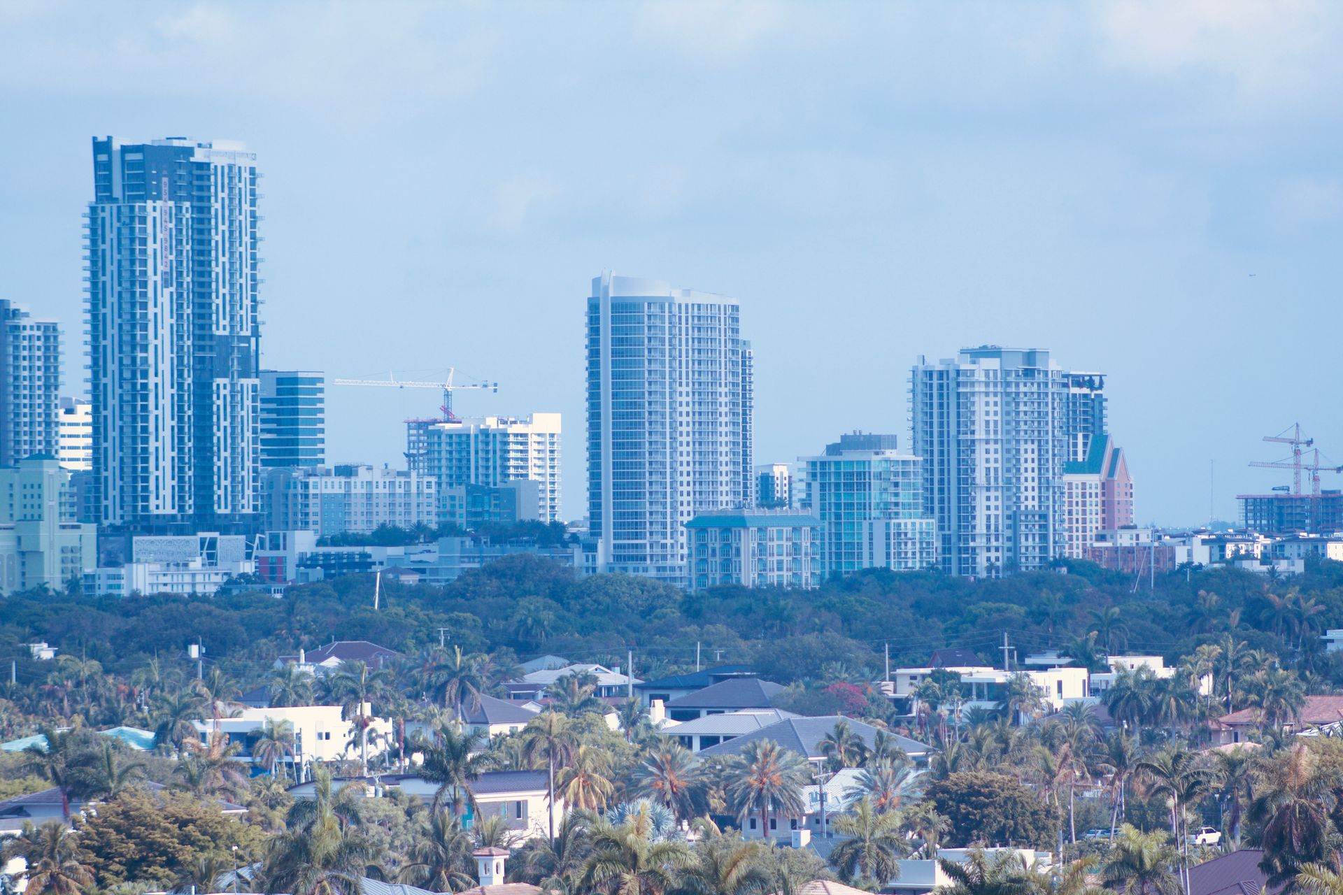 Cluster of glass high-rise skyscrapers rising above the Miami Brickell skyline
