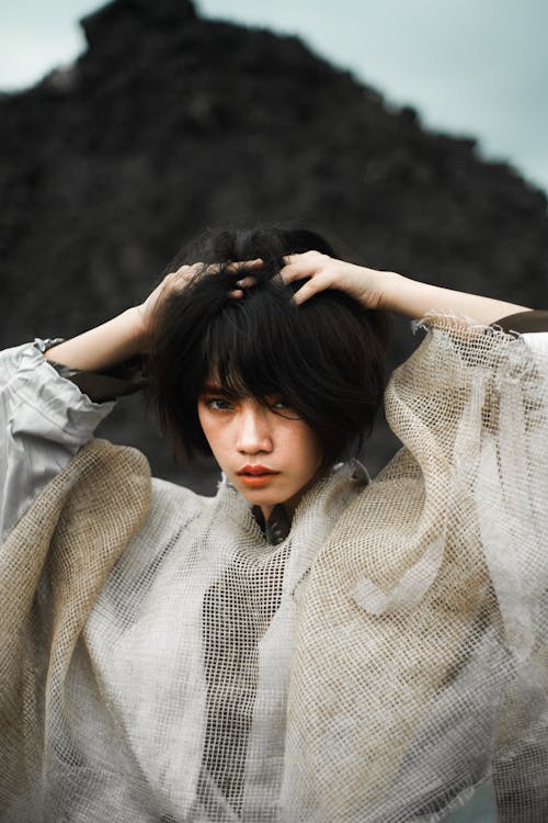 Photo Of Woman Holding Her Hair