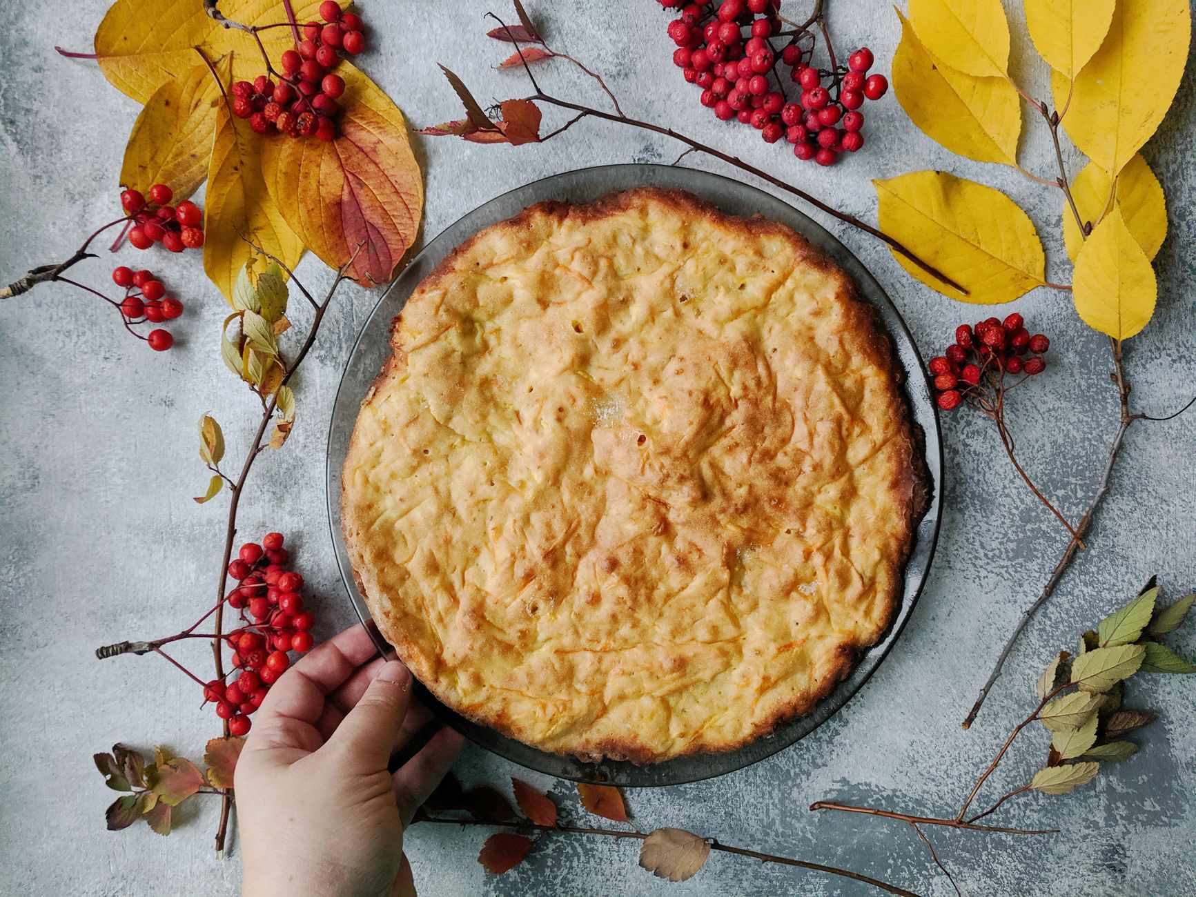 Serving shepherd‘s pie with side of steamed vegetables