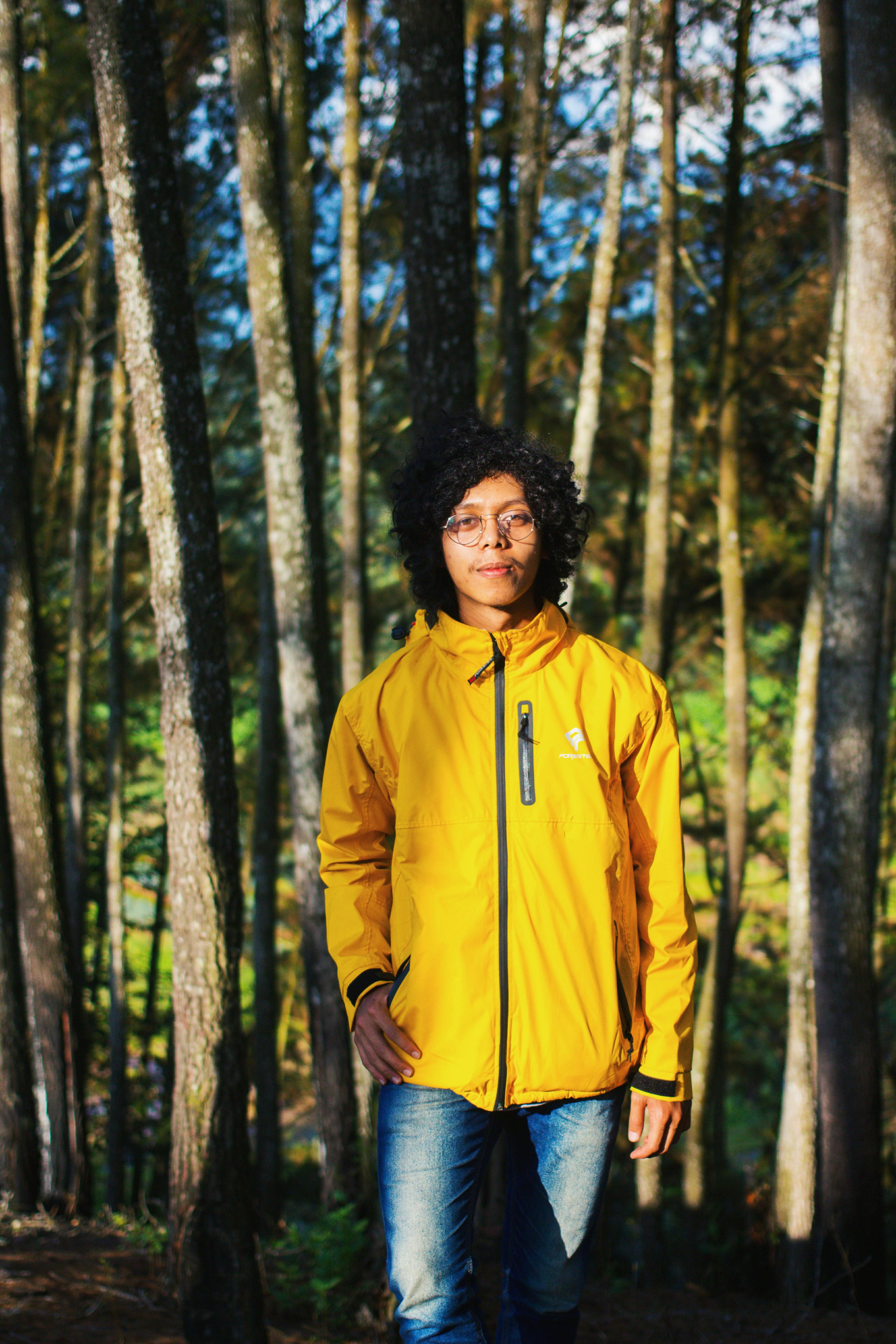 Man Wearing Yellow and Black Fila Jacket · Free Stock Photo