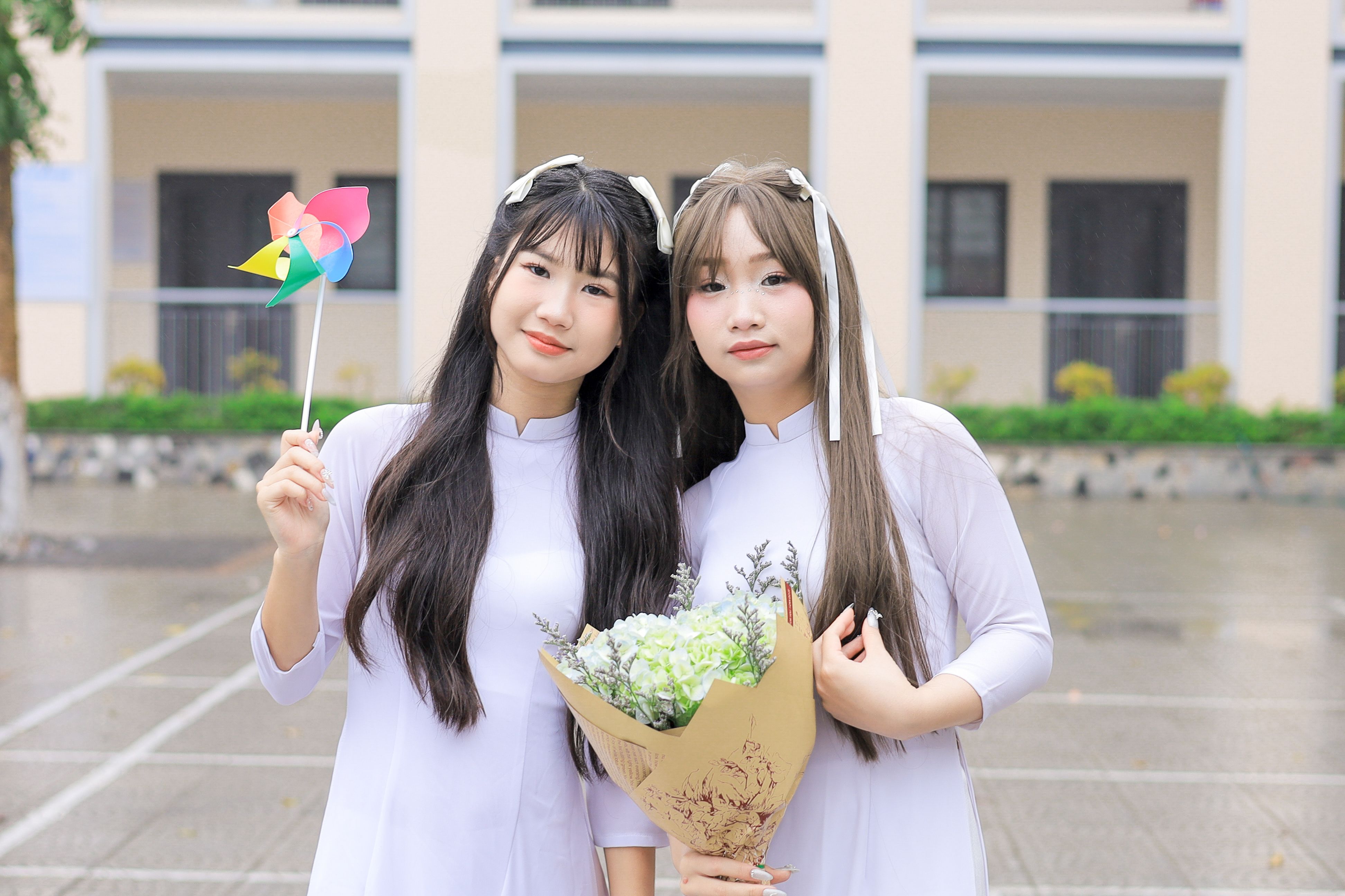 Two Young Women in Traditional Dresses Outdoors · Free Stock Photo