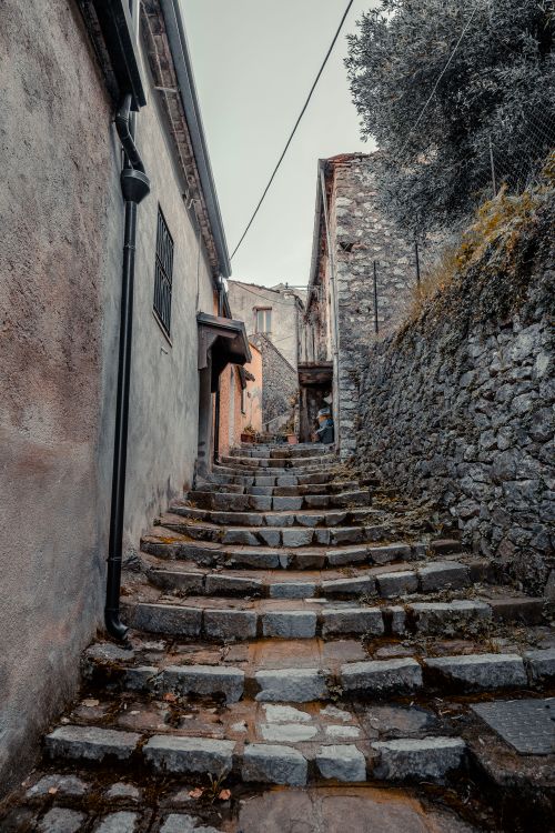 Free Discover the rustic stone steps of Castelsaraceno, Italy, capturing old-world charm in Basilikata. Stock Photo