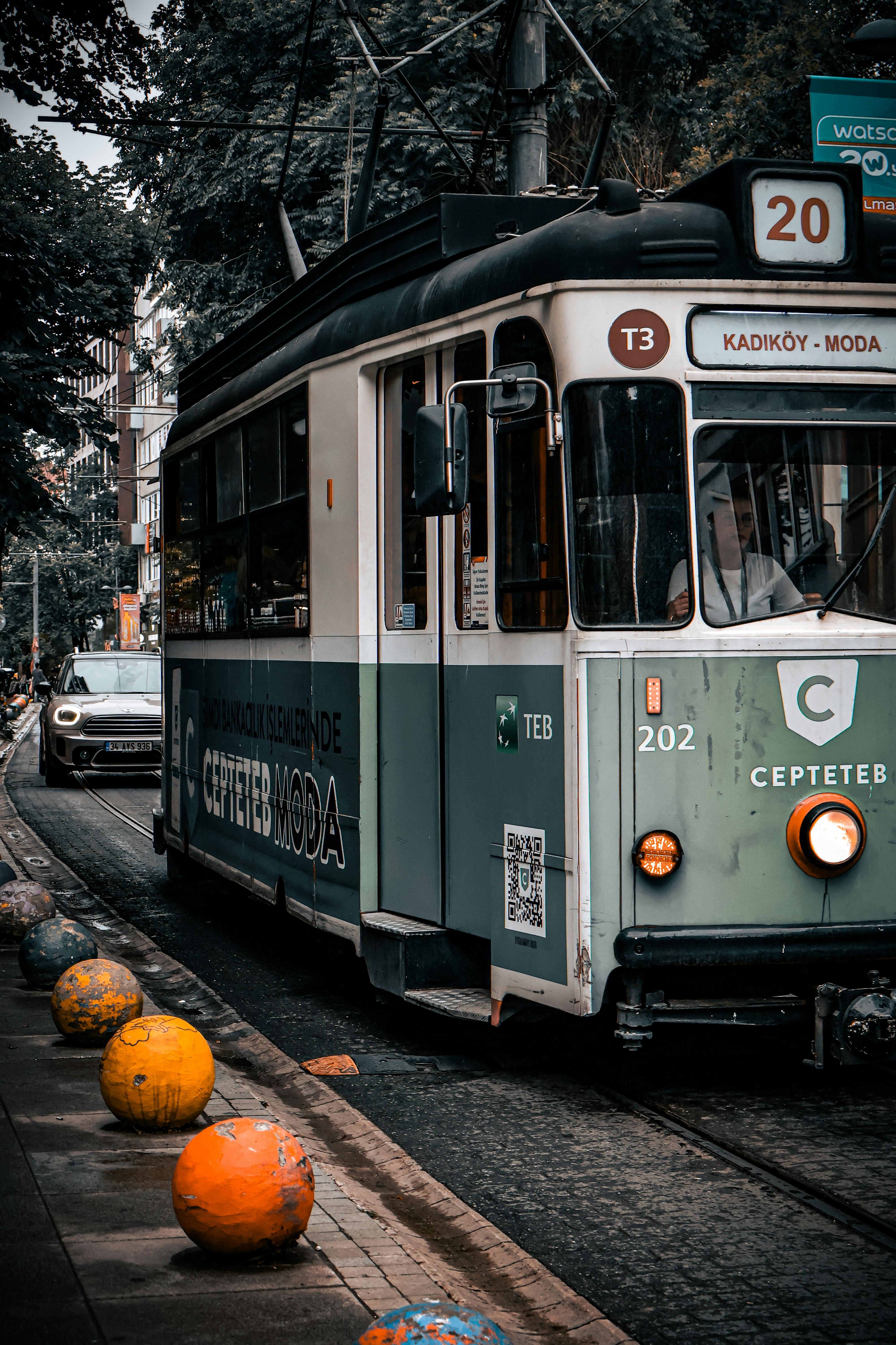 Free Colorful tram on iconic Kadıköy Moda line in Istanbul offers nostalgic city travel. Stock Photo