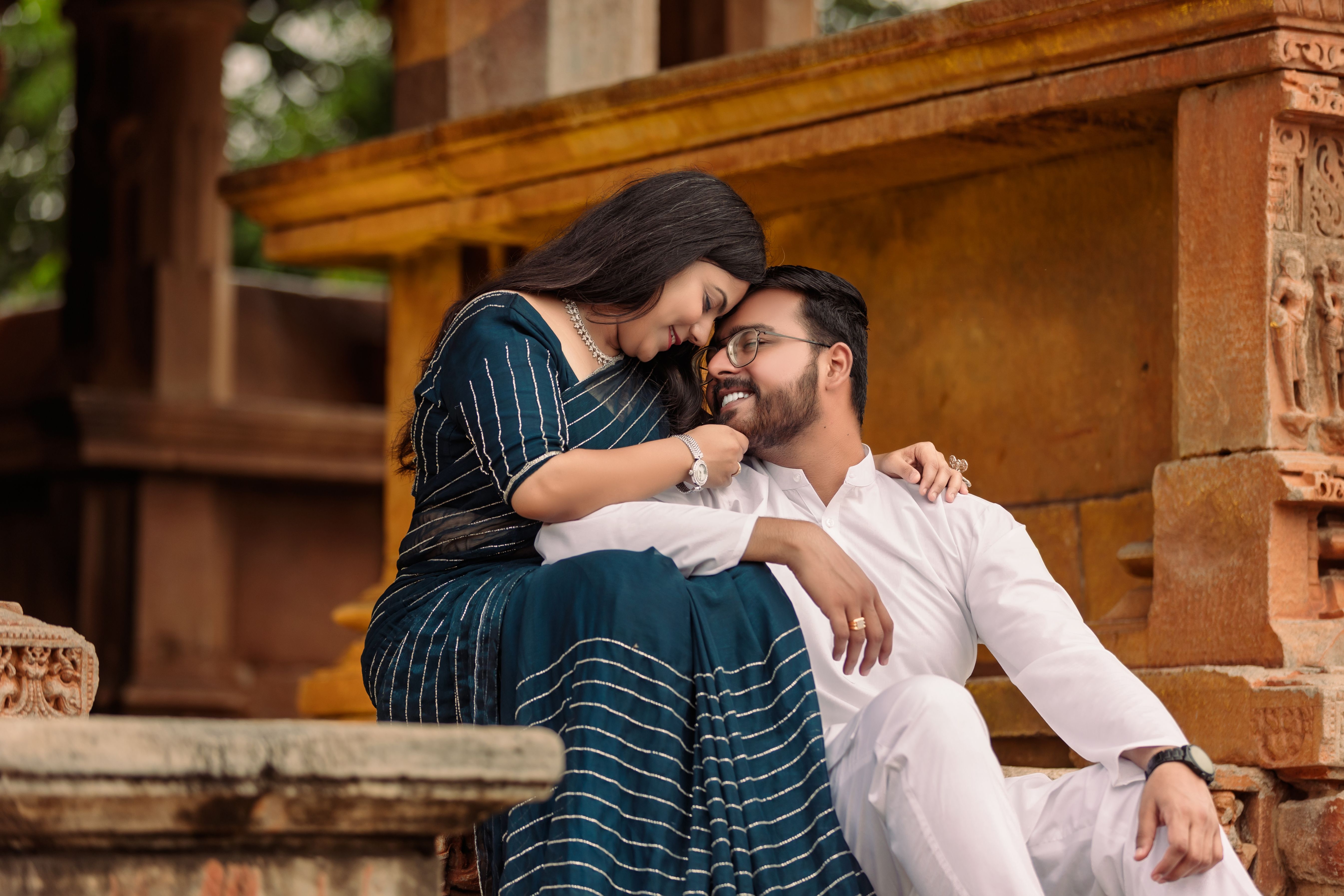 Romantic Couple Posing in Traditional Attire · Free Stock Photo