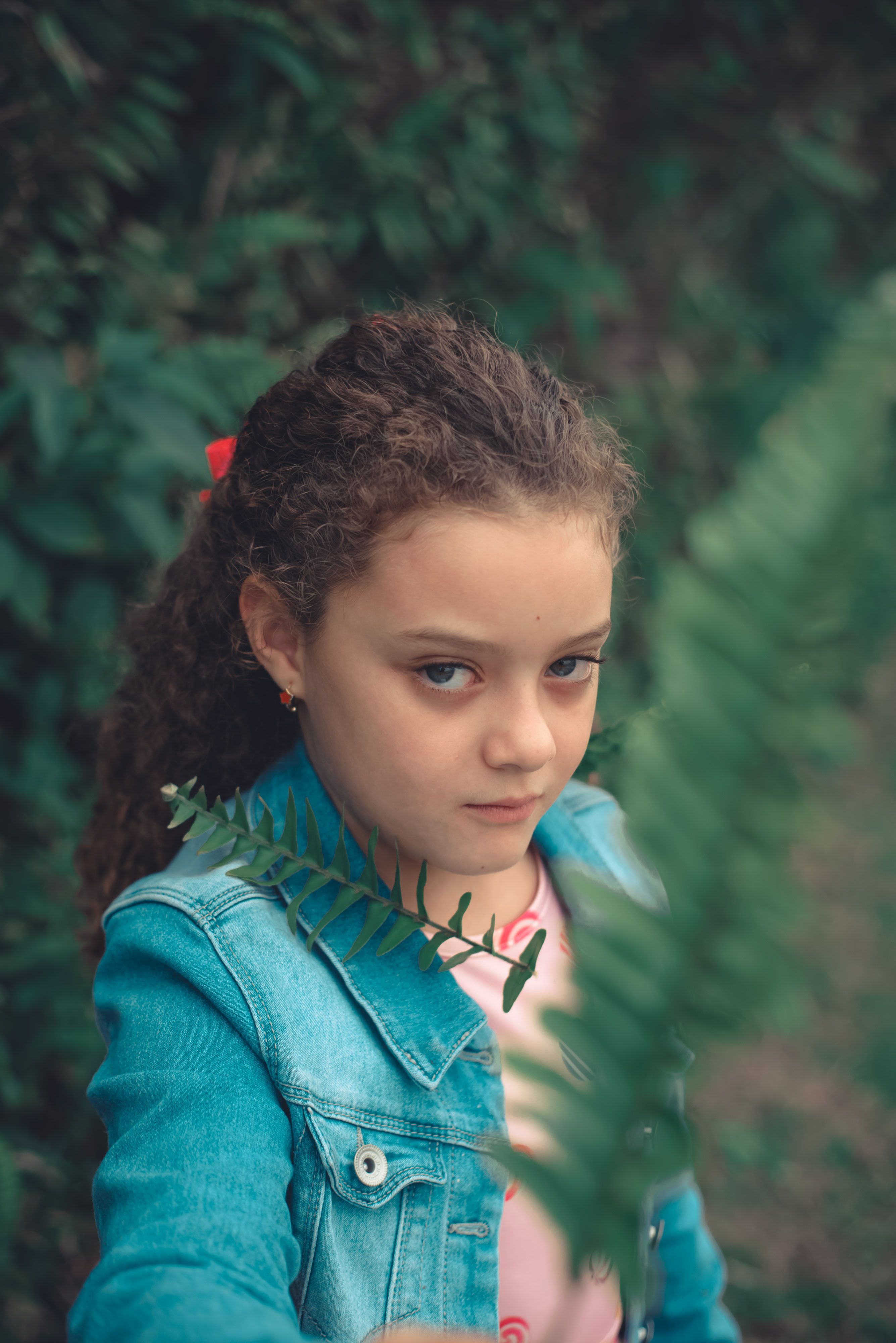Portrait of Young Girl in Denim Jacket Outdoors · Free Stock Photo