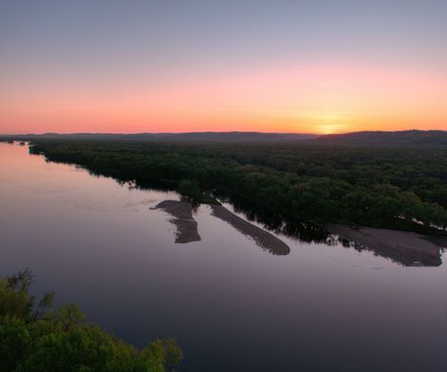 Free Beautiful sunset over Mississippi River near Pepin, Wisconsin, with vibrant skies and calm waters. Stock Photo