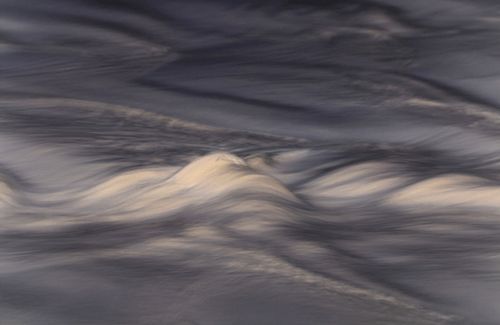 Free A stunning abstract view of ocean waves captured in Guaratuba, Paraná, Brazil during a serene day. Stock Photo
