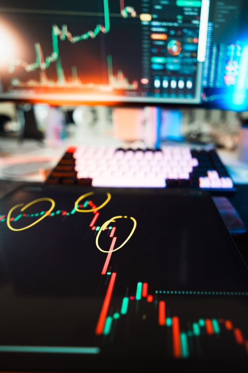 Free Close-up of cryptocurrency market data visualization on screens with highlighted trends and charts. Stock Photo