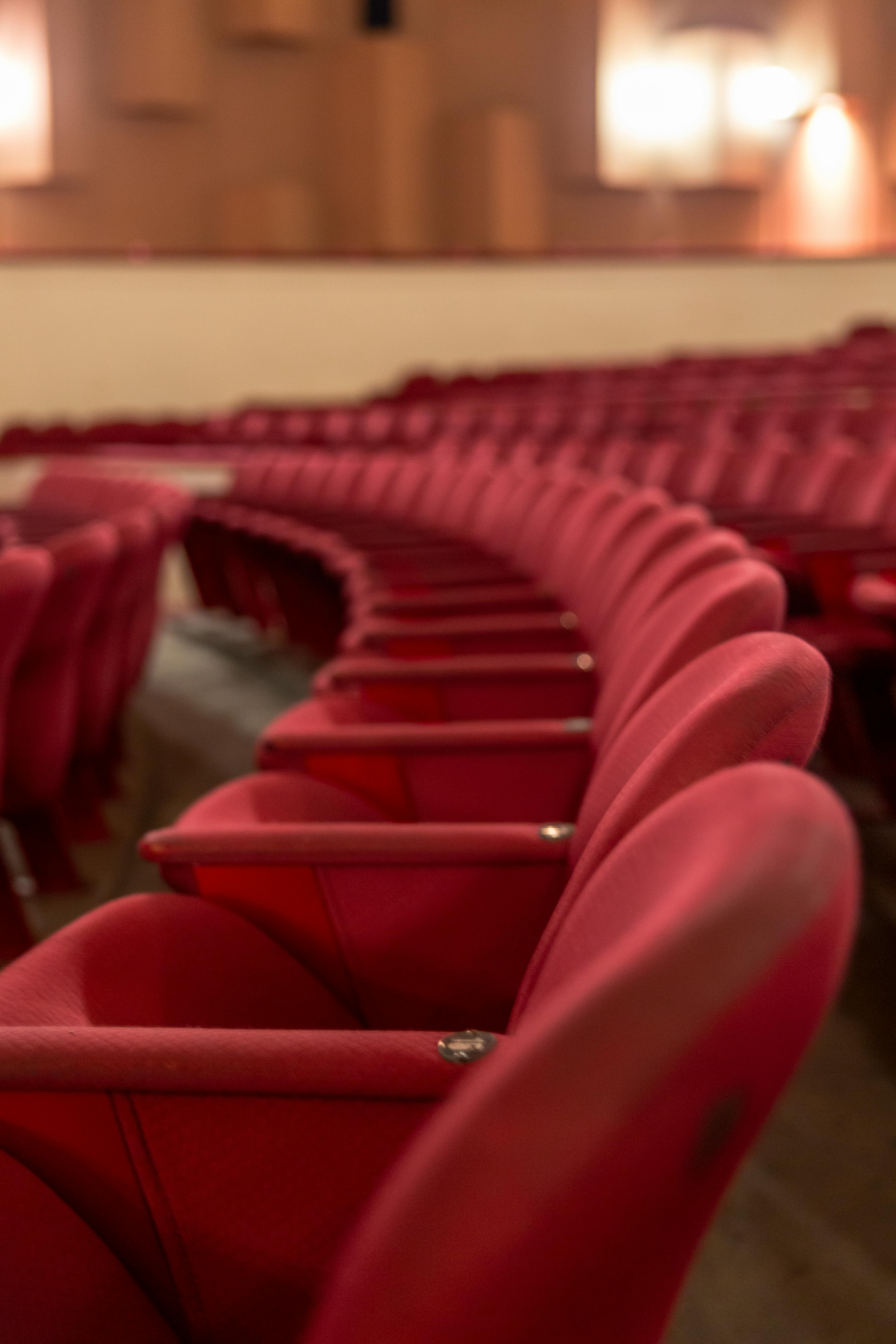 Free A row of red theater seats in an empty auditorium, Mar del Plata, Argentina. Stock Photo