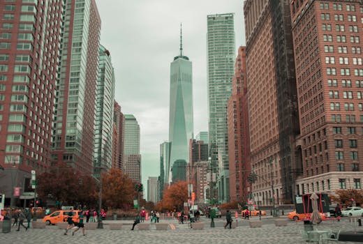 Vibrant cityscape of downtown New York City featuring the iconic One World Trade Center.