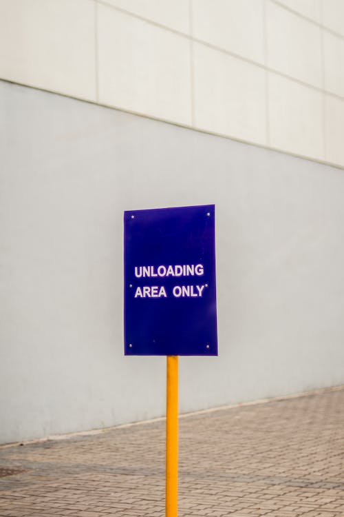 Free Unloading Area Only Signage Stock Photo