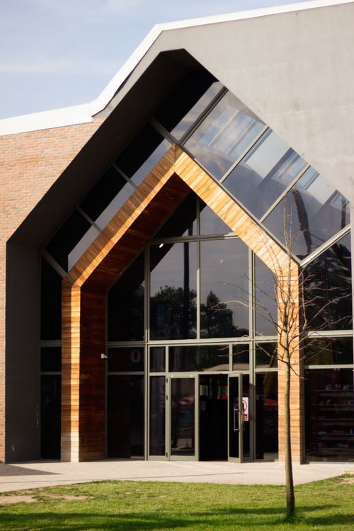 Modern Architectural Entrance with Glass Facade · Free Stock Photo