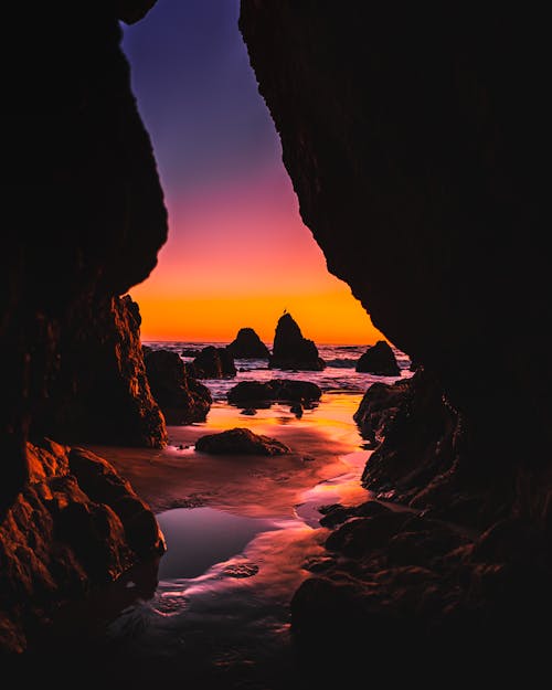 Silhouette Photography of Rocks During Golden Hour