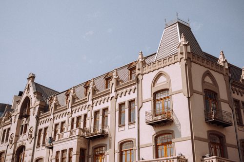 Free A classic building showcasing Tbilisi's unique architectural style under a clear sky. Stock Photo