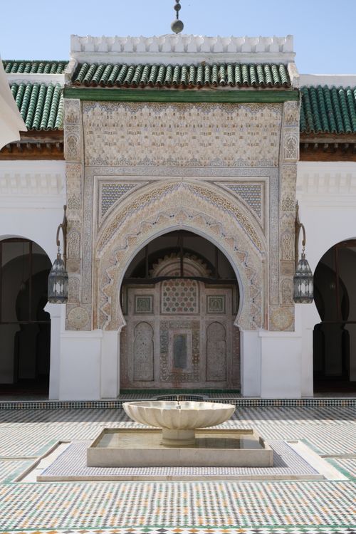 Free Elegant Moroccan architectural detail with a central fountain in courtyard. Stock Photo