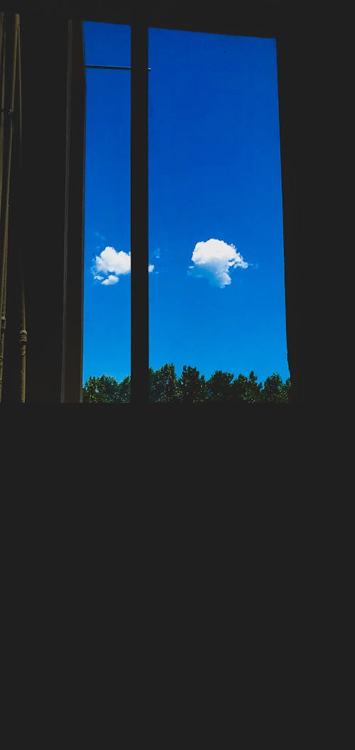 Бесплатное стоковое фото с облако, окно, синее небо