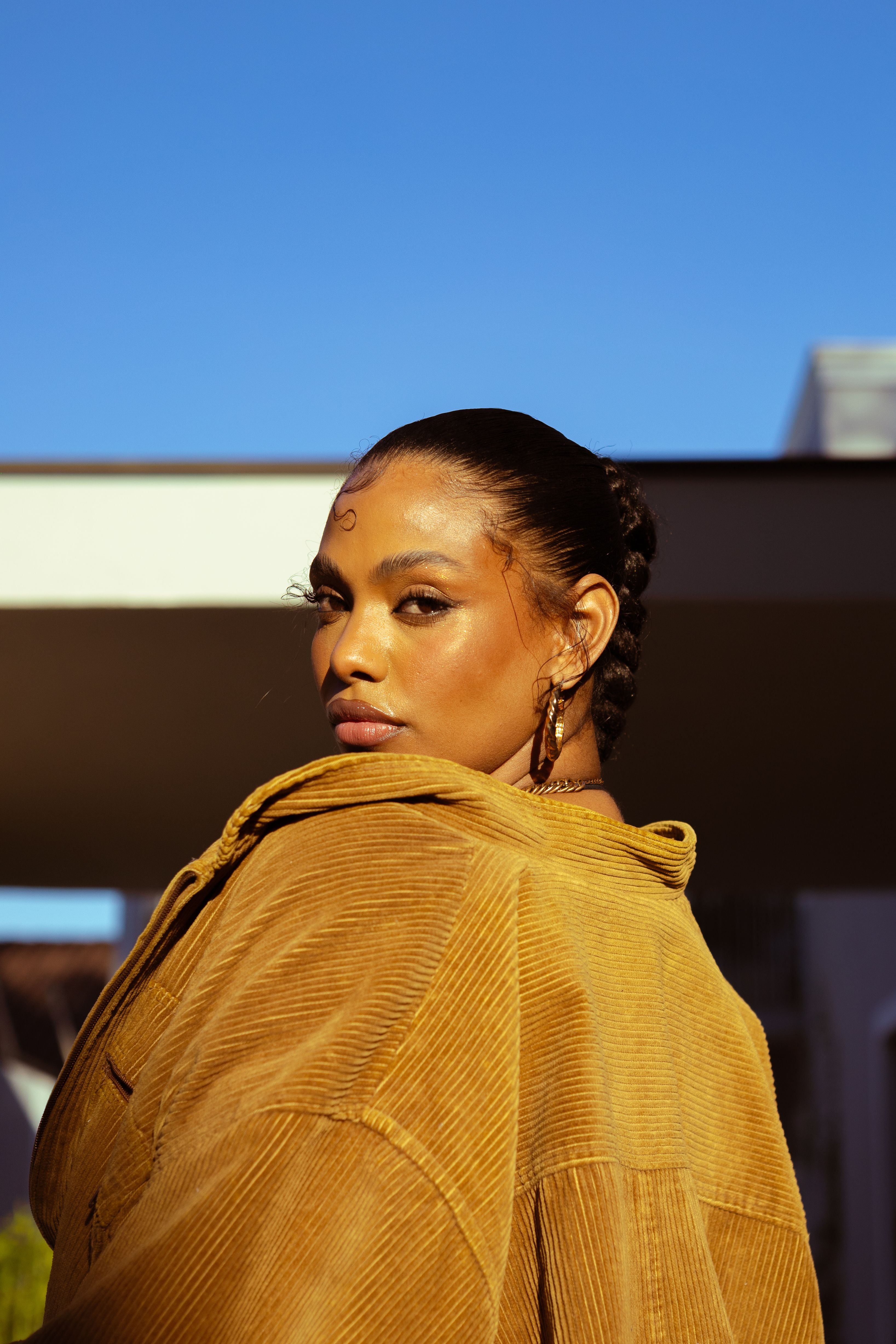 Portrait of woman in golden light outdoors · Free Stock Photo