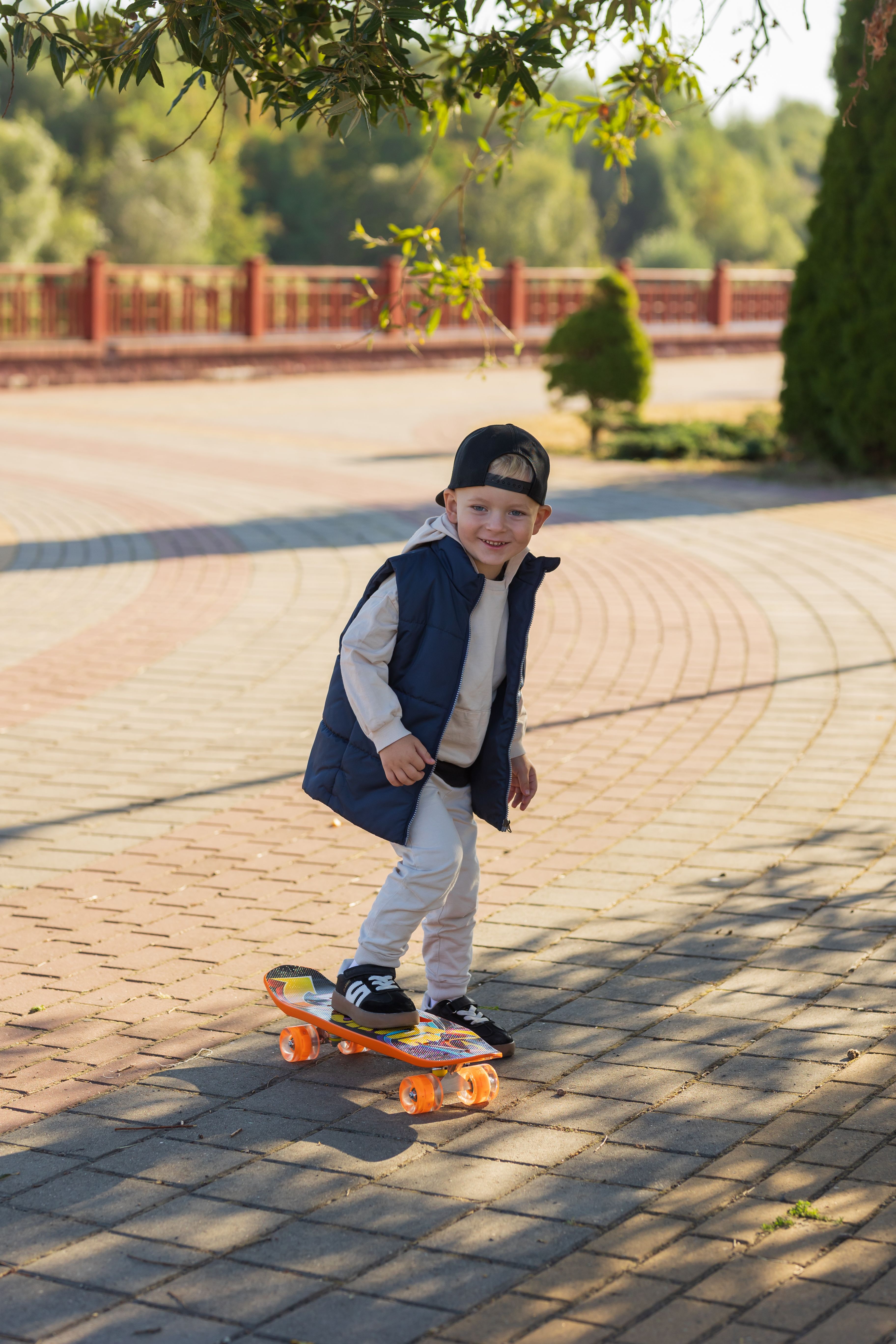 Young Boy Enjoying Skateboarding in the Park · Free Stock Photo