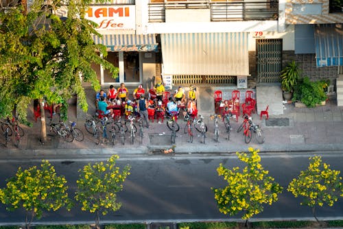 Free Cyclists Standing on Sidewalk Stock Photo