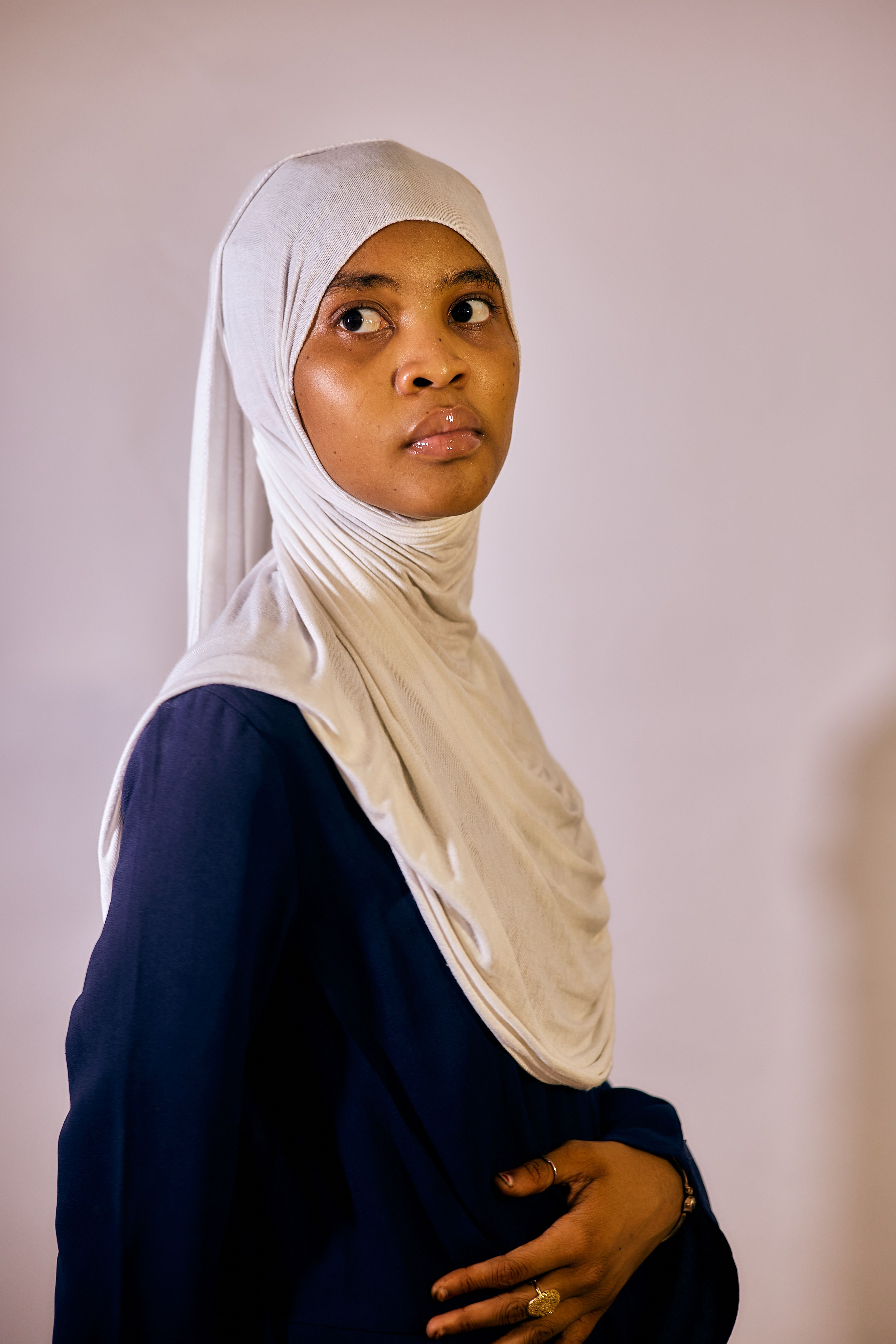 Portrait of a Thoughtful Woman in Hijab · Free Stock Photo