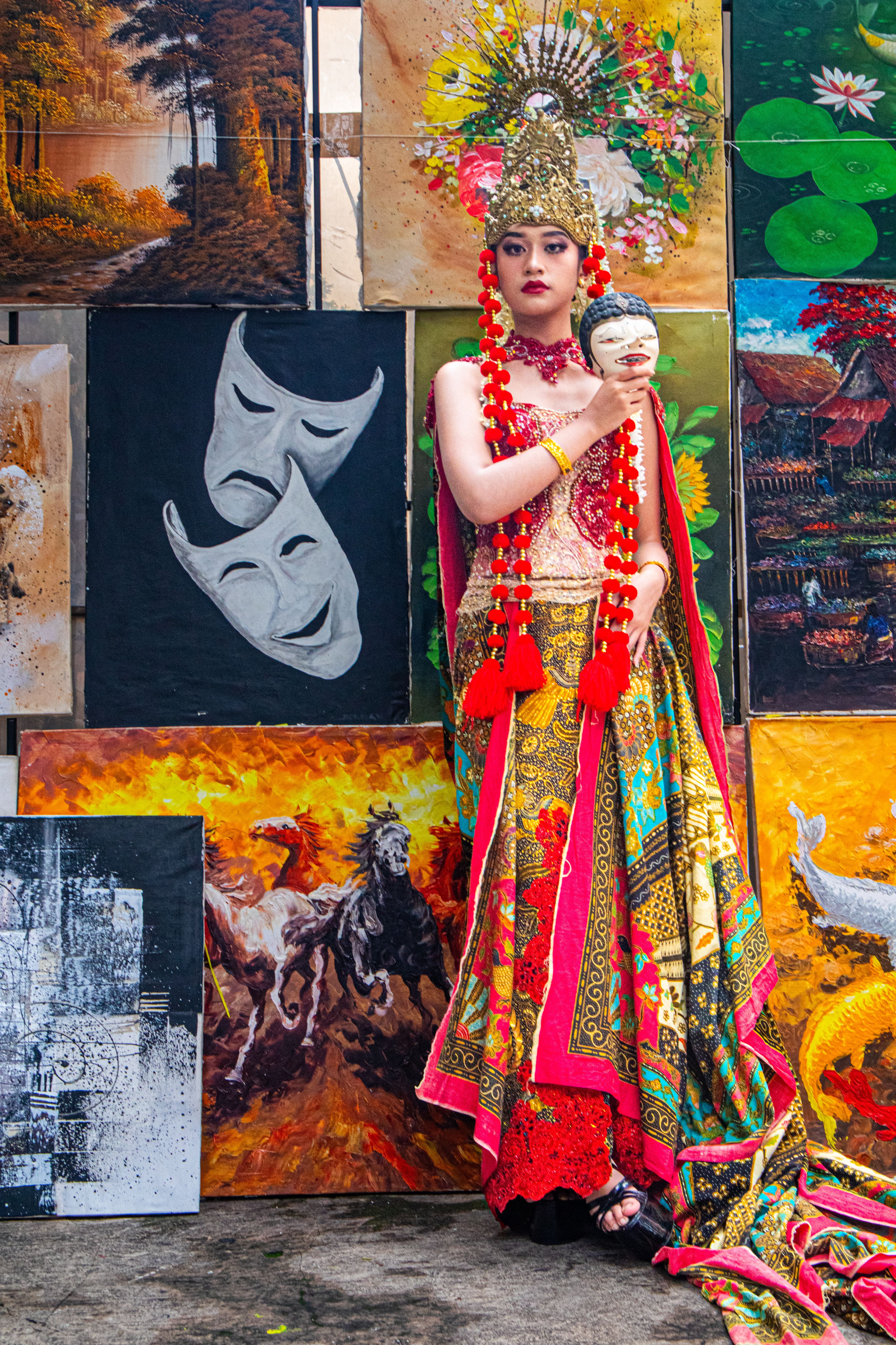 Vibrant Indonesian traditional costume with artistic backdrop on Braga Street, Bandung.