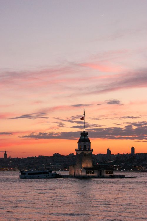 Free Scenic view of Maiden's Tower during a vibrant sunset over Istanbul, Turkey. Stock Photo