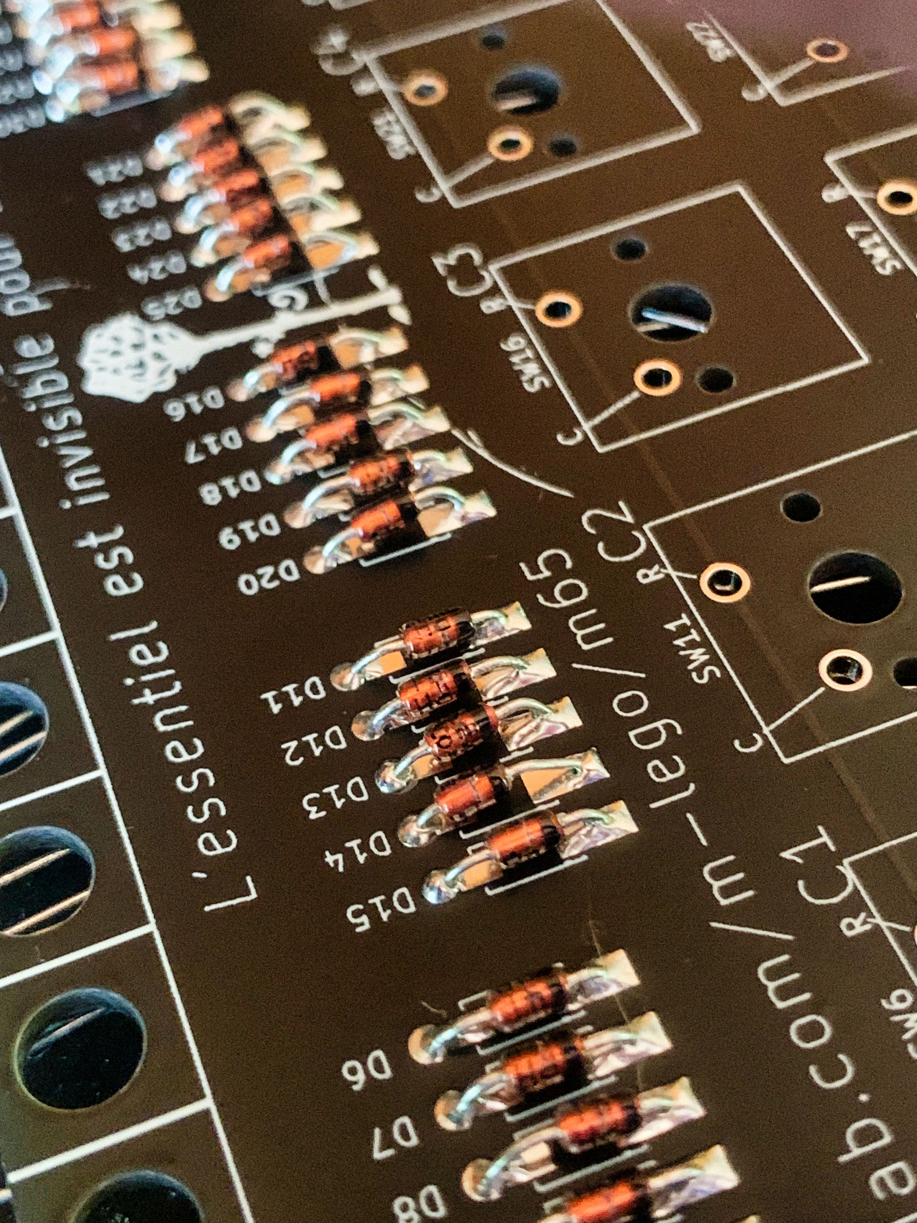 assorted through-hole resistors laid out on a breadboard