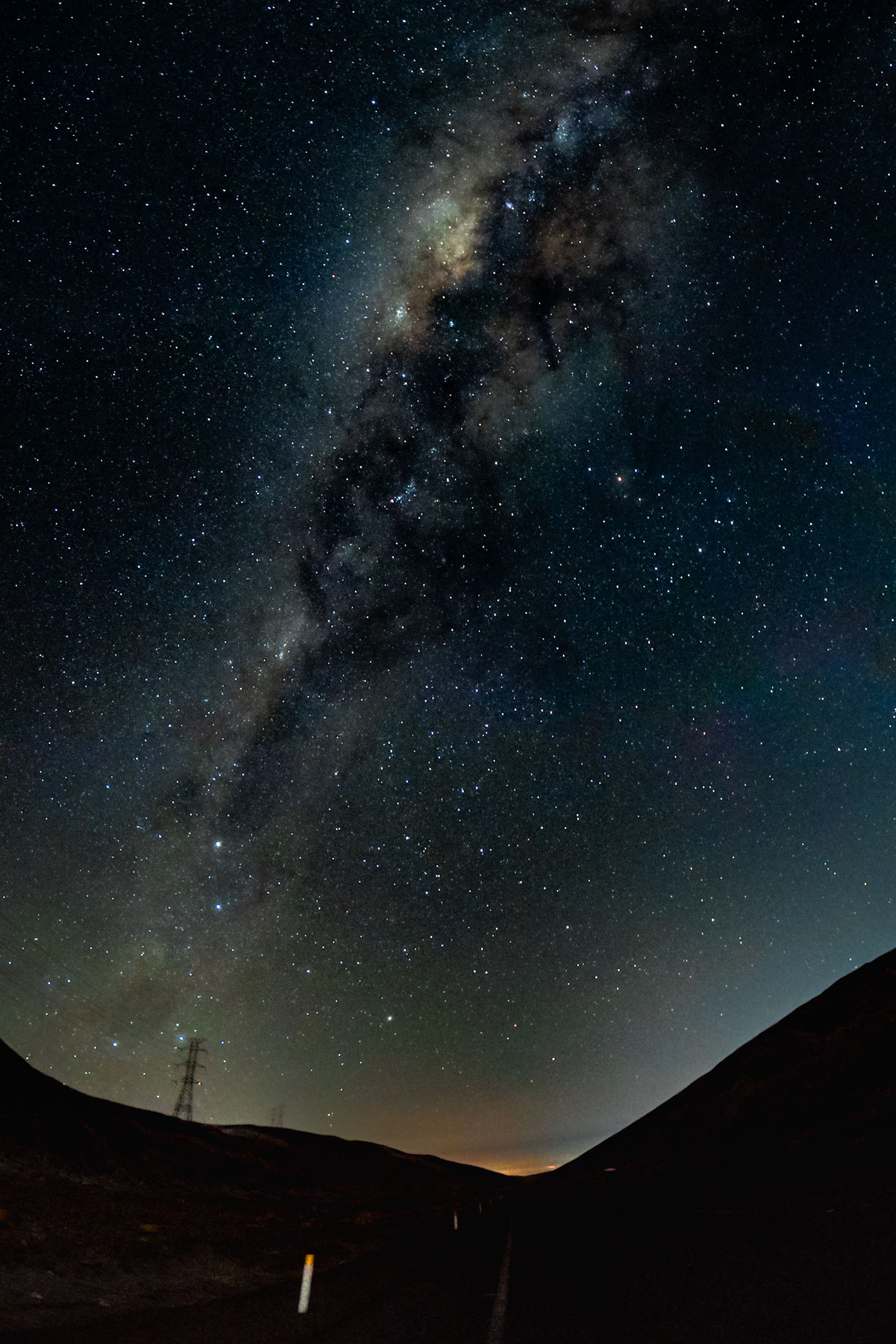 The milky way over a desert road · Free Stock Photo