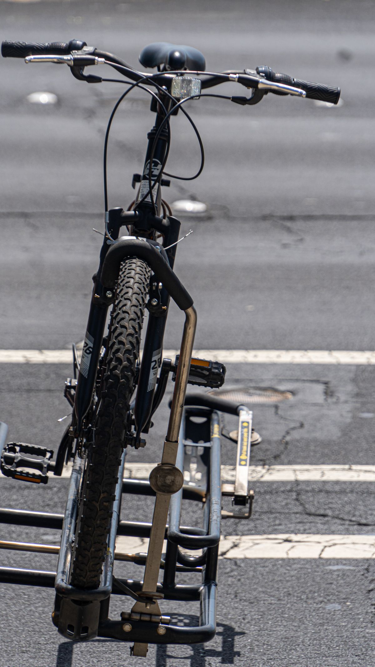 Secured urban bicycle showing practical everyday cycling equipment