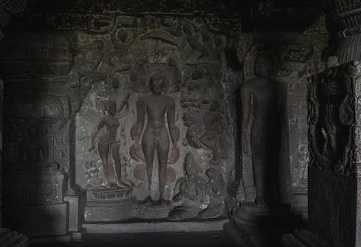 Explore the ancient rock-cut sculptures of the Ellora Caves, Maharashtra, India.